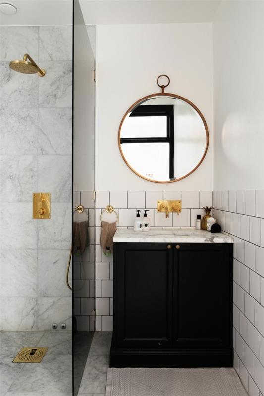 στρογγυλός καθρέφτης μπάνιου μαύρη μονάδα ματαιοδοξίας λευκά πλακάκια μπάνιου
