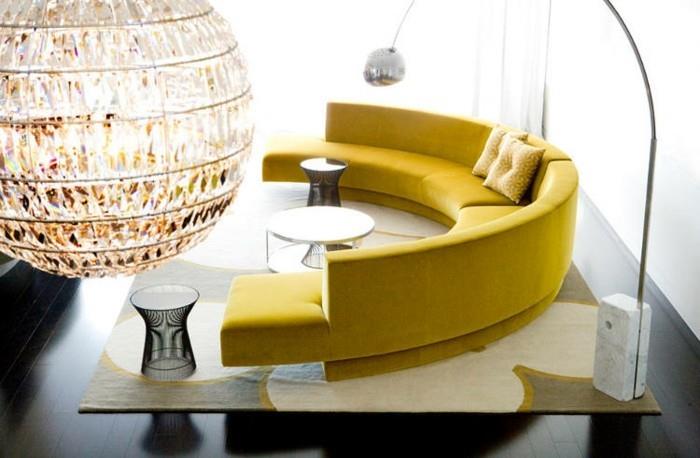 στρογγυλός καναπές κίτρινος στρογγυλός καναπές ανοιχτό χαλί σκούρο δάπεδο