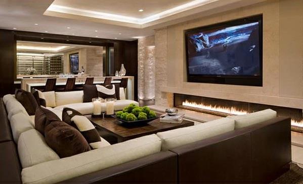 κομψά σαλόνια με καφέ καναπέδες τηλεοράσεις φωτισμό οροφής