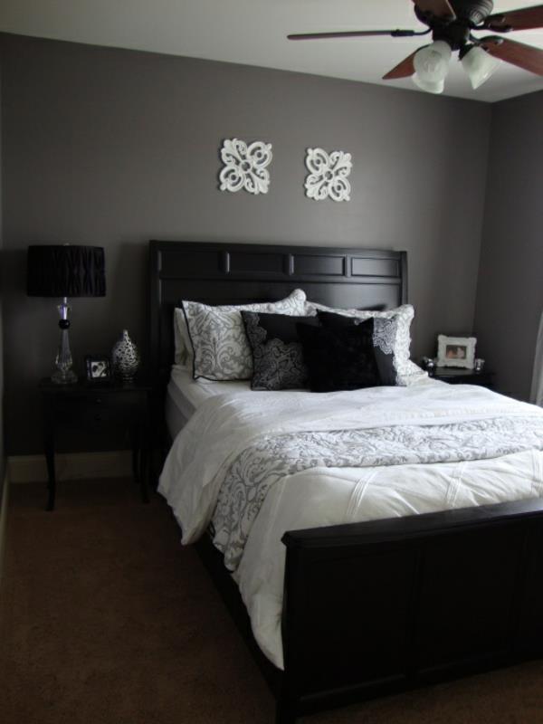υπνοδωμάτιο τοίχο χρώμα γκρι τόνους ξύλινο κρεβάτι χαλί κομοδίνο