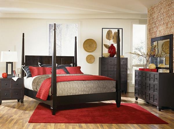 υπνοδωμάτιο με επίπλωση από ασιατικό σκούρο ξύλο σκούρα κόκκινα υφάσματα