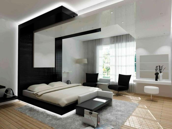 υπνοδωμάτιο με επίπλωση μαύρου χρώματος ανοιχτό γκρι χαλί
