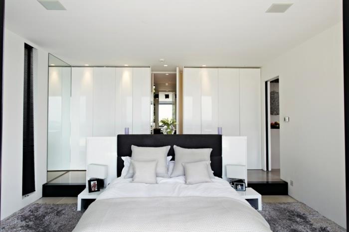 υπνοδωμάτιο λευκό γκρι χαλί μοντέρνα ντουλάπα μαύρο κρεβάτι κεφαλάρι