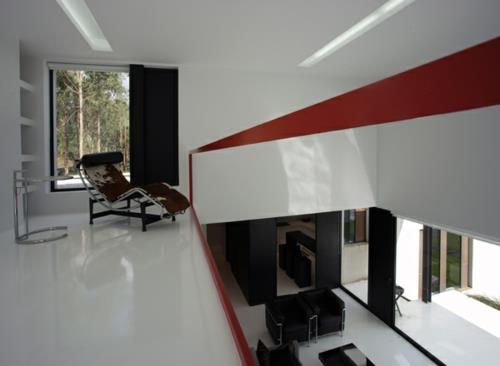 έπιπλα μαύρου λευκού σπιτιού κόκκινο πάτωμα γωνία θέασης