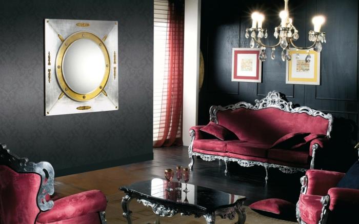 σαλόνι με μαύρο τοίχο με επίπλωση πολυτελών κόκκινων καναπέδων κομψό τραπεζάκι σαλονιού