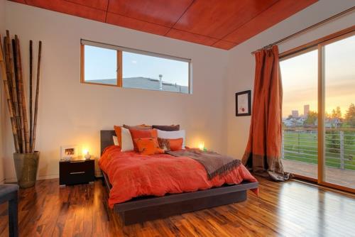 εντυπωσιακό υπνοδωμάτιο σε πορτοκαλί κουρτίνες φυσικό περιβάλλον