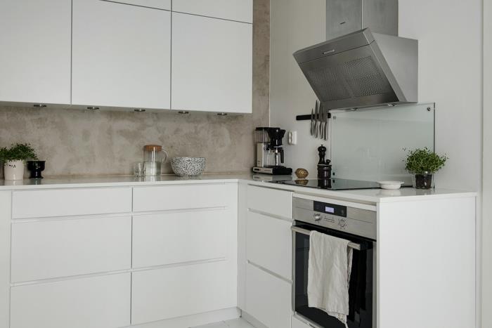 σκανδιναβική διακόσμηση επίπλων κουζίνας λευκά ντουλάπια ματ μεταλλική κουκούλα εξαγωγής