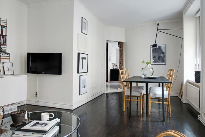 Σκανδιναβικό μικρό διαμέρισμα με έπιπλα τραπεζαρίας καρέκλες τραπεζάκι μαύρο