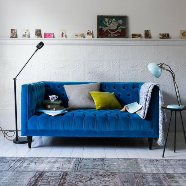 καναπές μπλε καναπές μαξιλάρια ουδέτερο σαλόνι χαλί