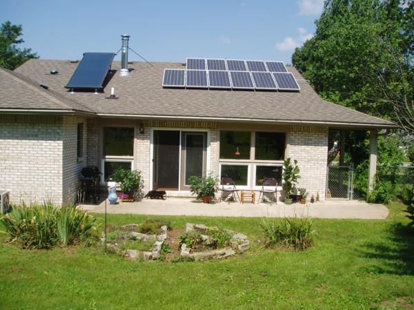 ηλιακό σύστημα και φωτοβολταϊκή εξοχική κατοικία