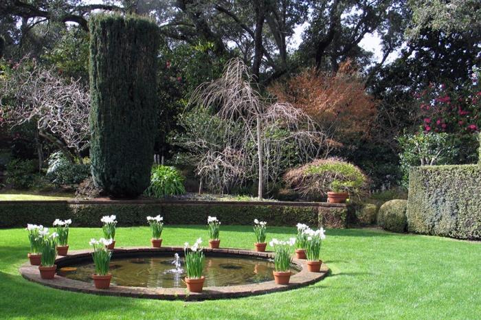 κήπο συντριβάνι κήπος διακοσμητική λίμνη συντριβάνι γύρω από γλάστρες