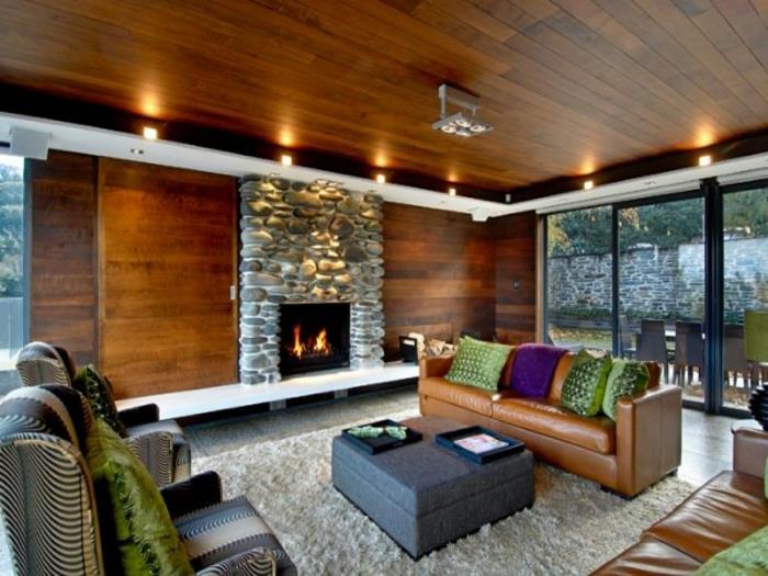 πέτρινος τοίχος σαλόνι φύση δερμάτινος καναπές χαλί ρίξτε μαξιλάρια