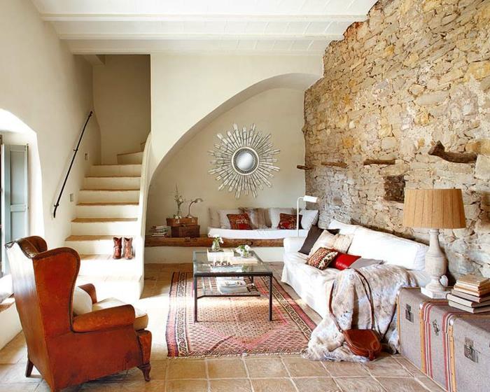 πέτρινο τοίχο σαλόνι ρουστίκ χαλί vintage πολυθρόνες εσωτερικές σκάλες