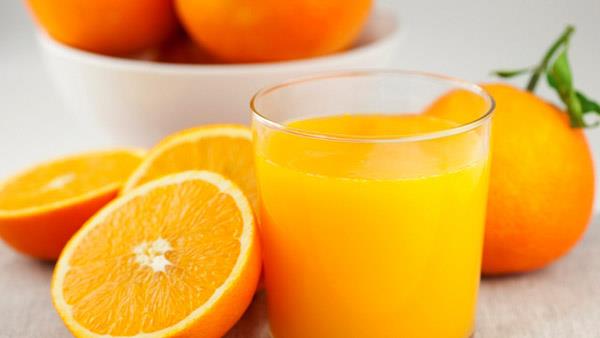λαμπερό δέρμα προσώπου υγιεινή τροφή πιείτε χυμό πορτοκαλιού υγιεινό και νόστιμο