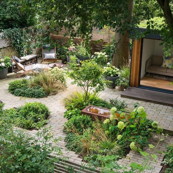 υπέροχος σχεδιασμός κήπου με πράσινους χώρους