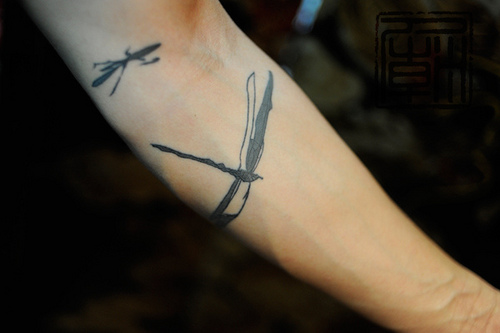 Laumžirgio tatuiruotės ant rankos