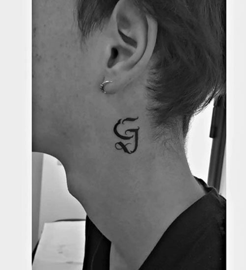 Magnetinės raidės G tatuiruotė reikšmė