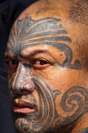 Genčių veido kaukių tatuiruotės dizainas