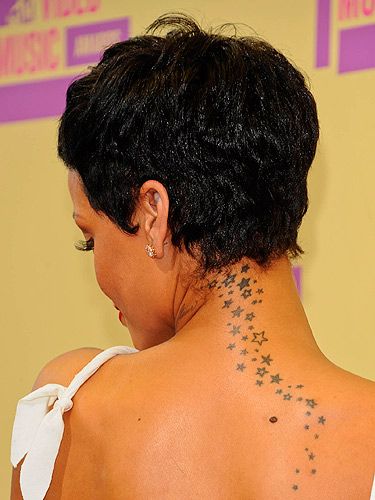 Rihanna tatuiruotės dizainas ant nugaros