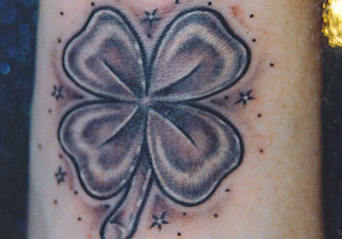 Shamrocks ir žvaigždžių tatuiruotė