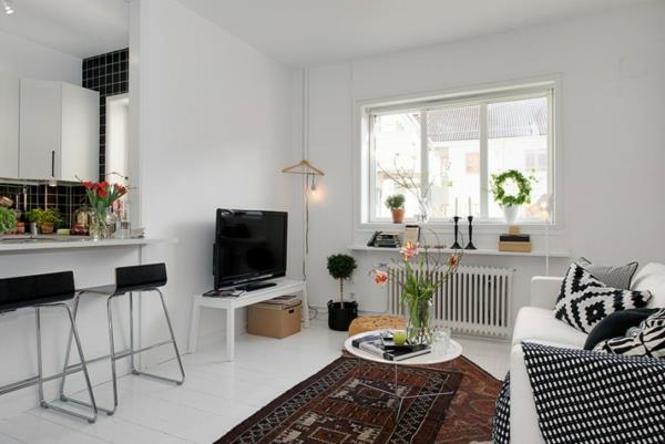μοντέρνο διαμέρισμα με λευκή επίπλωση καθιστικό άνετο