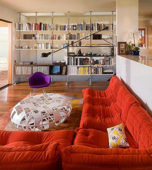 τροπική ατμόσφαιρα στο σπίτι φρέσκα χρώματα γωνιακός καναπές άνετος πορτοκαλί