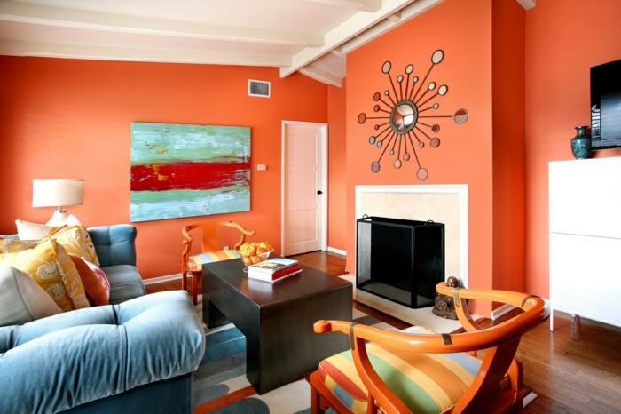 ιδέες χρώματος τοίχου σαλόνι σχεδιασμός πορτοκαλί τοίχοι τζάκι γαλάζιος καναπές