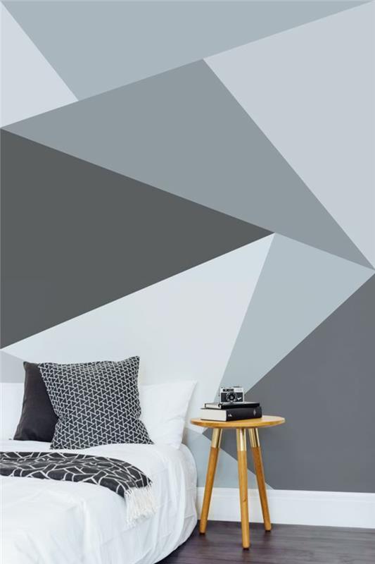 ιδέες σχεδιασμού τοίχου κρεβατοκάμαρα ταπετσαρία τοίχου γεωμετρικό μοτίβο πλαϊνό τραπέζι σκούρο πάτωμα