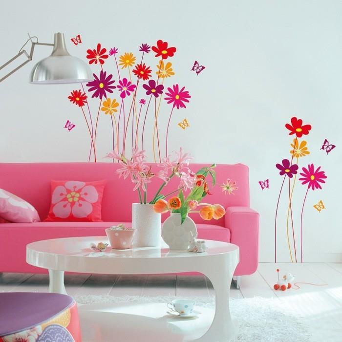 αυτοκόλλητα τοίχου λουλούδια χρωματιστά λουλούδια ροζ καναπές λευκό τραπεζάκι σαλονιού