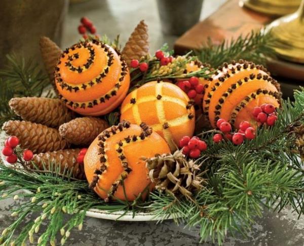 χριστουγεννιάτικα μπαχαρικά πορτοκάλια γαρίφαλα