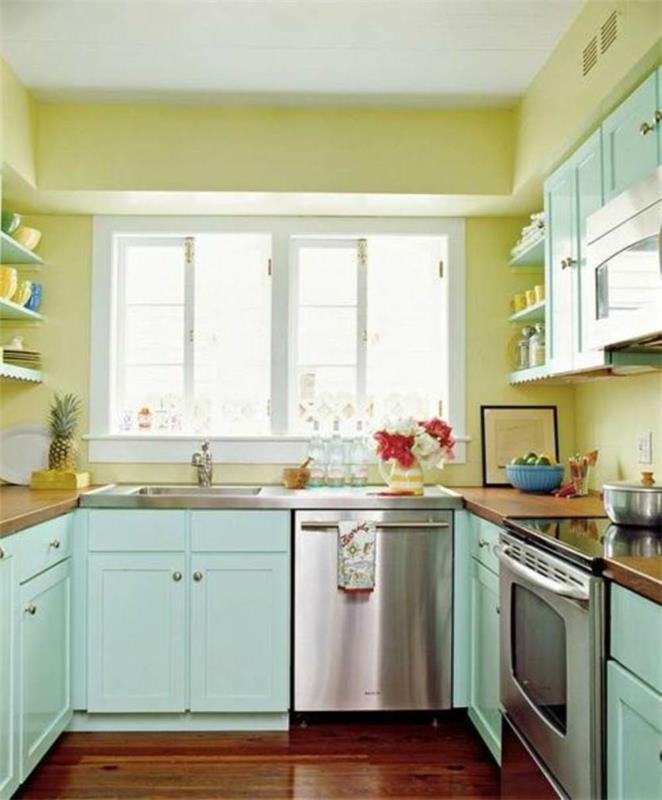 βάψιμο τοίχων ιδέες κουζίνας κίτρινοι τοίχοι ανοιχτό πράσινα ντουλάπια κουζίνας