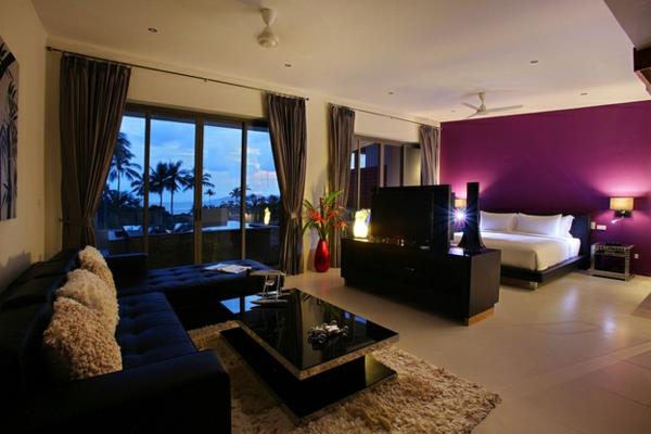 Επιπλώστε διαμέρισμα ενός δωματίου υπνοδωμάτιο με τηλεόραση, καναπέ -τραπεζάκι χαλί