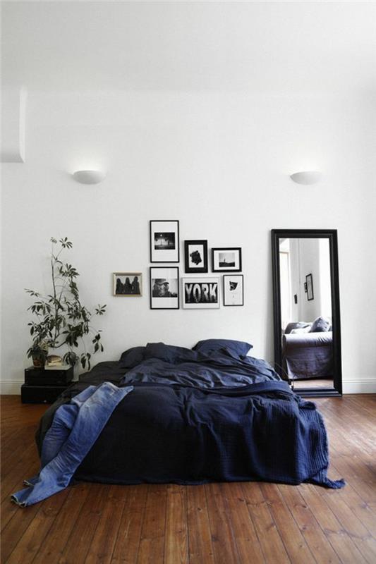 ιδέες διαβίωσης υπνοδωμάτιο σκούρο μπλε κρεβάτι ξύλινος καθρέφτης δαπέδου