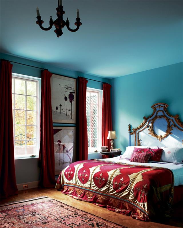ιδέες διαβίωσης υπνοδωμάτιο γαλάζιοι τοίχοι κόκκινοι τόνοι χαλί