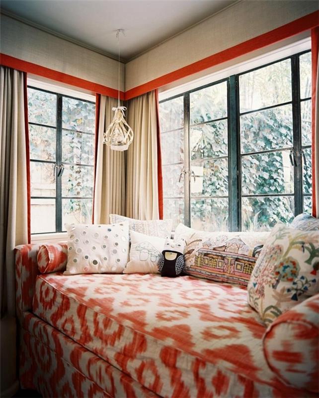 ιδέες σαλονιού σαλόνι πορτοκαλί μοτίβο και πολλά ρίχνουν μαξιλάρια