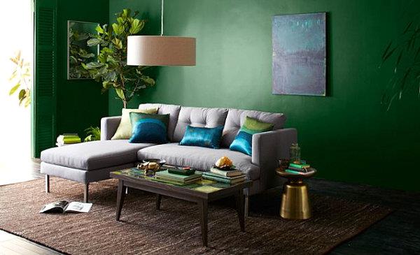 σαλόνι επίπλωση διακόσμηση τοίχου πράσινο μαξιλάρι ζωγραφική καναπέ χαλί
