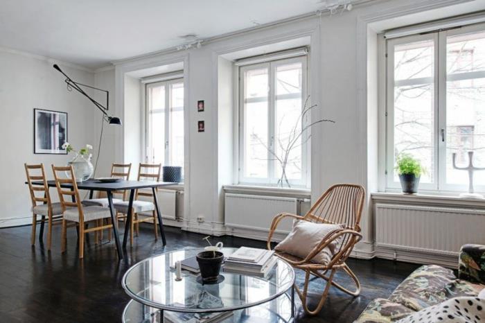 σαλόνι εσωτερικό σκανδιναβικό στυλ διαβίωσης στρογγυλό γυάλινο τραπέζι τραπεζαρία ξύλινες καρέκλες
