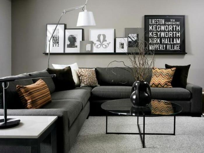 ιδέες επίπλωσης δωματίου σαλόνι σκοτεινός γωνιακός καναπές στρογγυλή διακόσμηση τοίχου τραπεζιού σαλονιού